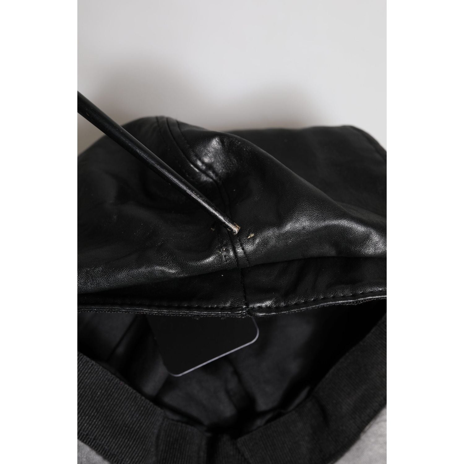 Front view with bag zipped and handles upright.