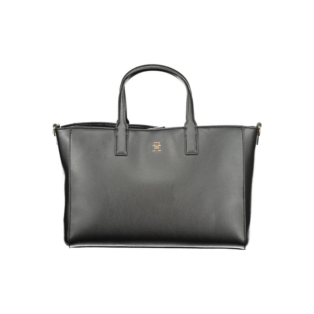 Front view with bag zipped and handles upright.