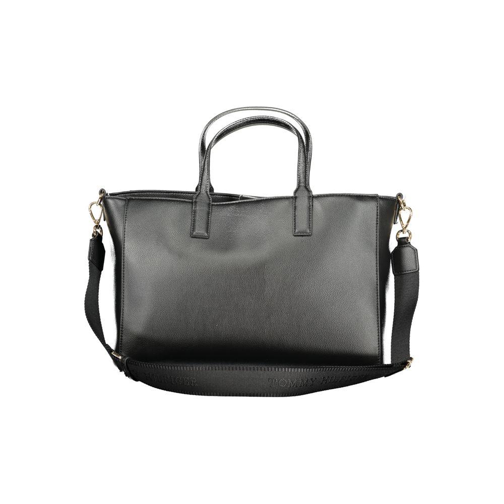 Front view with bag zipped and handles upright.