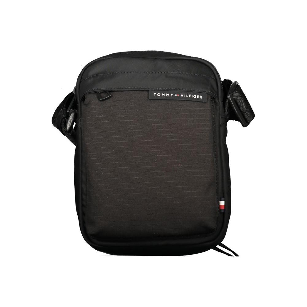 Front view with bag zipped and handles upright.