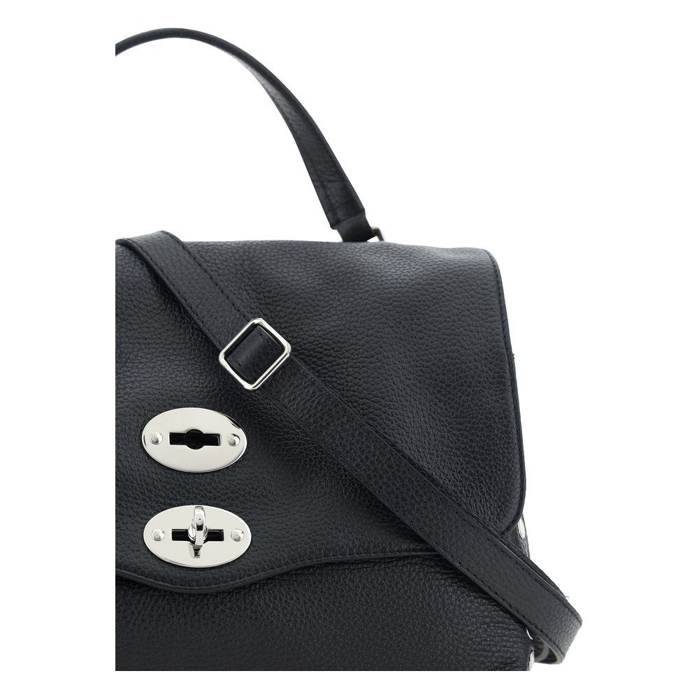 Front view with bag zipped and handles upright.