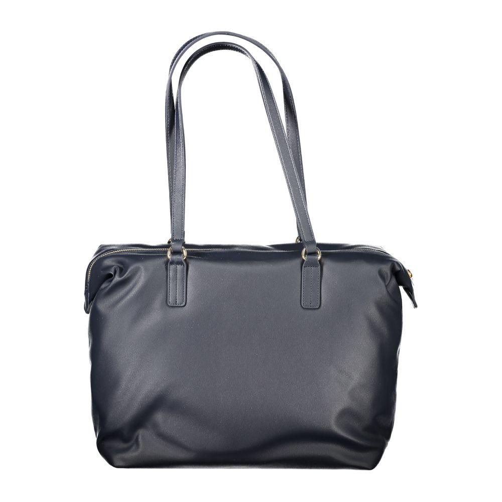 Front view with bag zipped and handles upright.