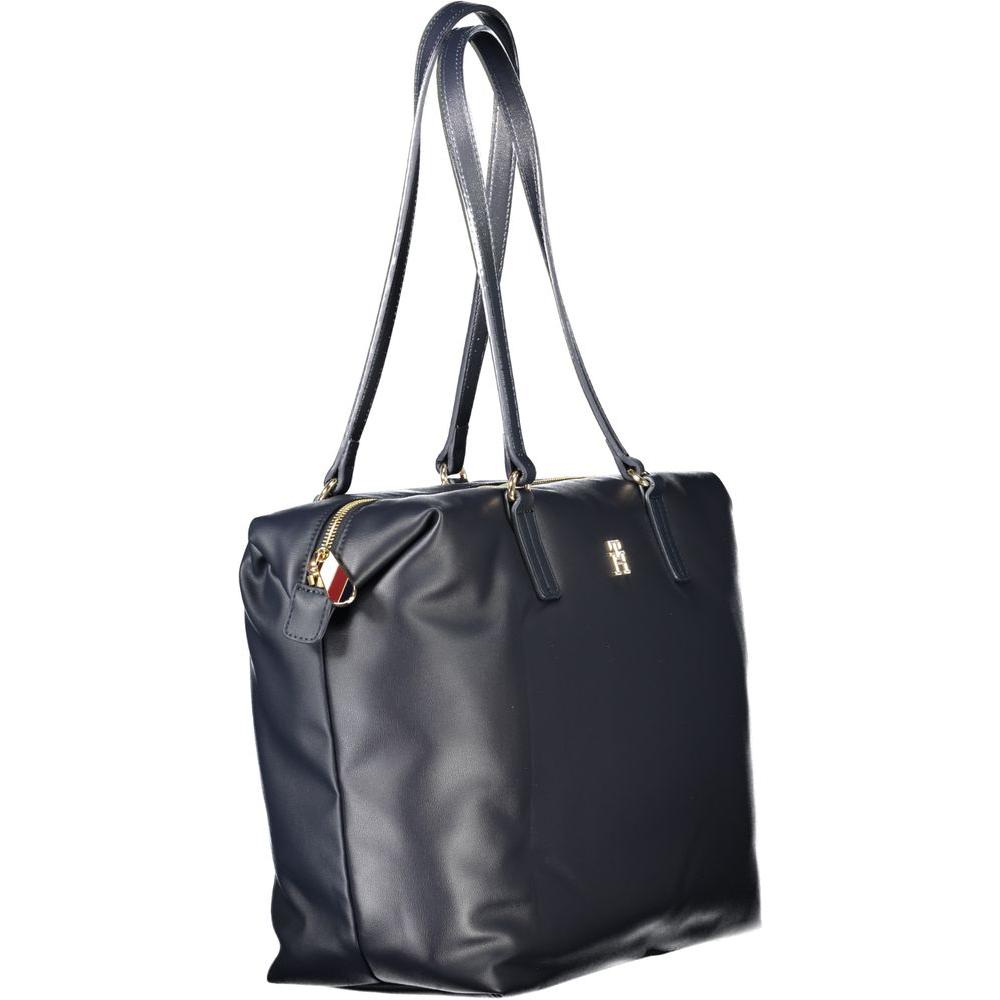 Front view with bag zipped and handles upright.