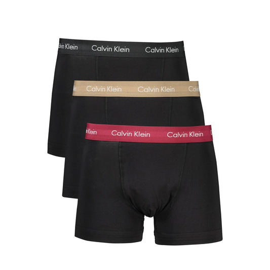 Calvin Klein black cotton underwear tri-pack with beige, black, and bordeaux elastic waistband. Features logo on waistband.