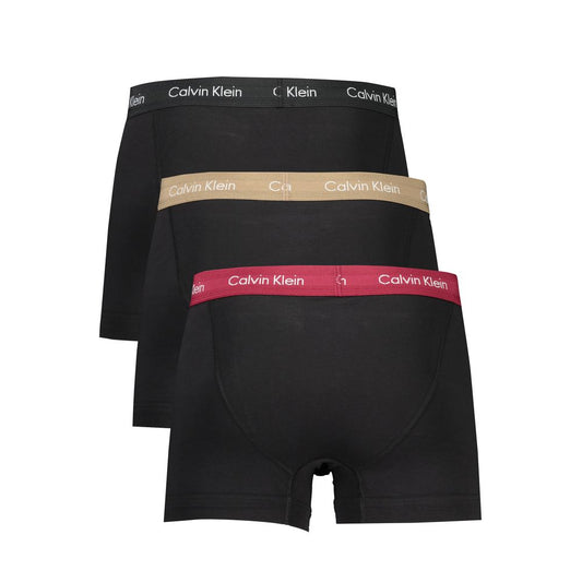 Calvin Klein black boxer underwear tri-pack with elastic waistband in beige, black, and bordeaux colors, featuring logo.