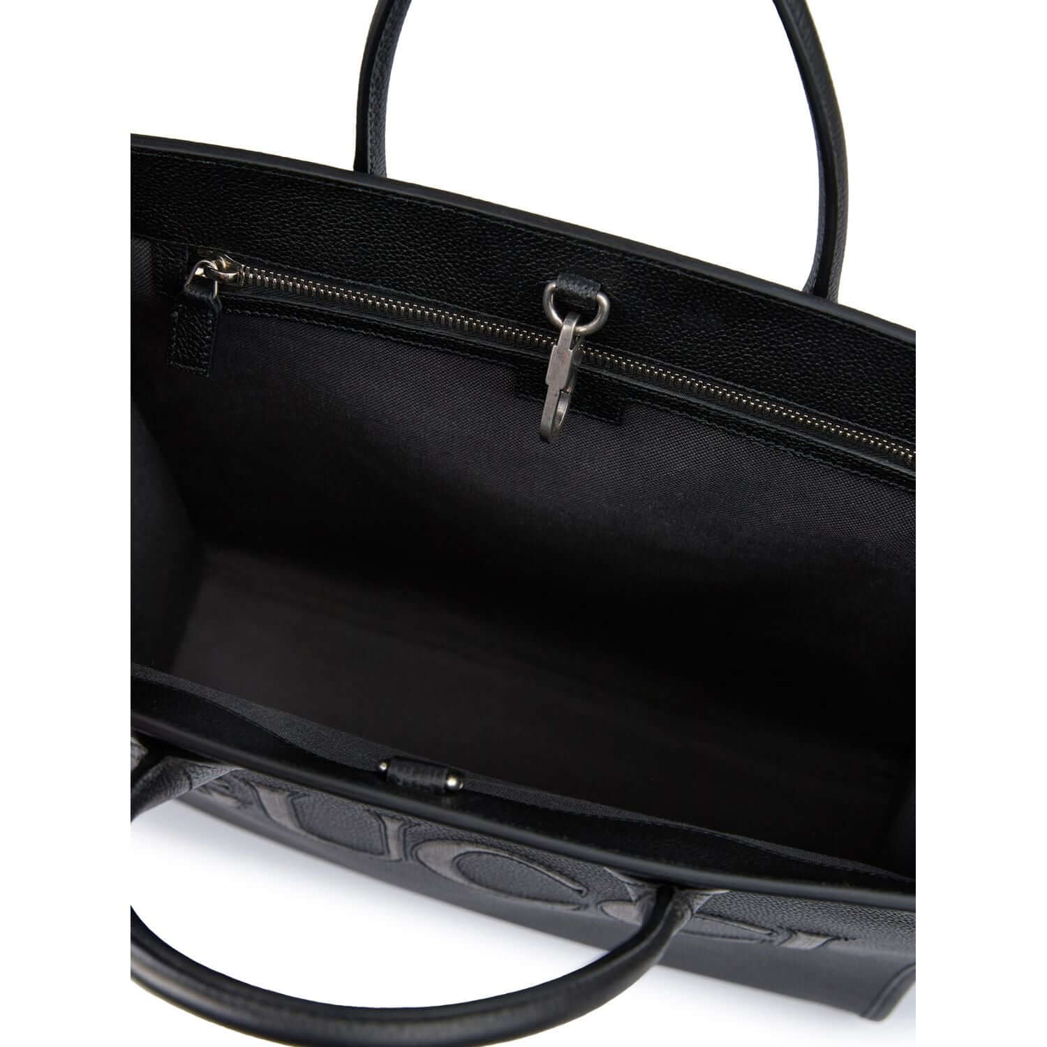 Front view with bag zipped and handles upright.