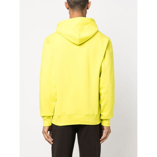 Back view of Billionaire Sweaters Yellow hoodie with hood up, featuring embroidered logo on sleeve, true to size fit shown on model.